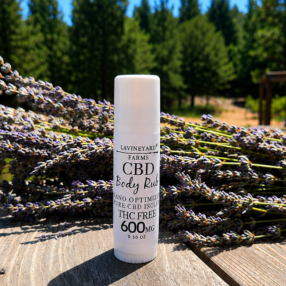 CBD body rub bottle with lavender in the background